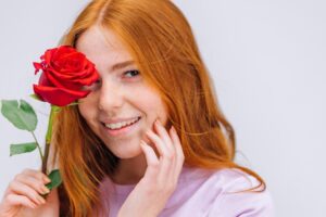 Woman with radiant, glowing skin smiling confidently after a Valentine’s Day facial at EA Wellness Med Spa in Chantilly, VA